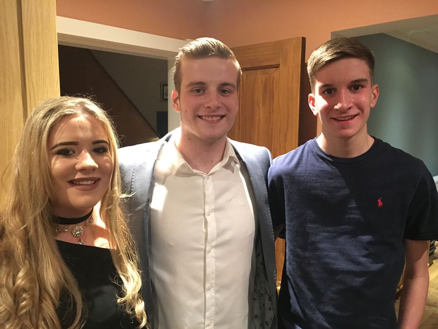 John with Elizabeth and Robert, dressed up for an evening out